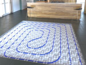 plancher chauffant avec dalles à plots
